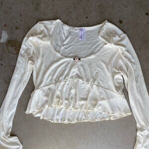 Out from under flower blouse